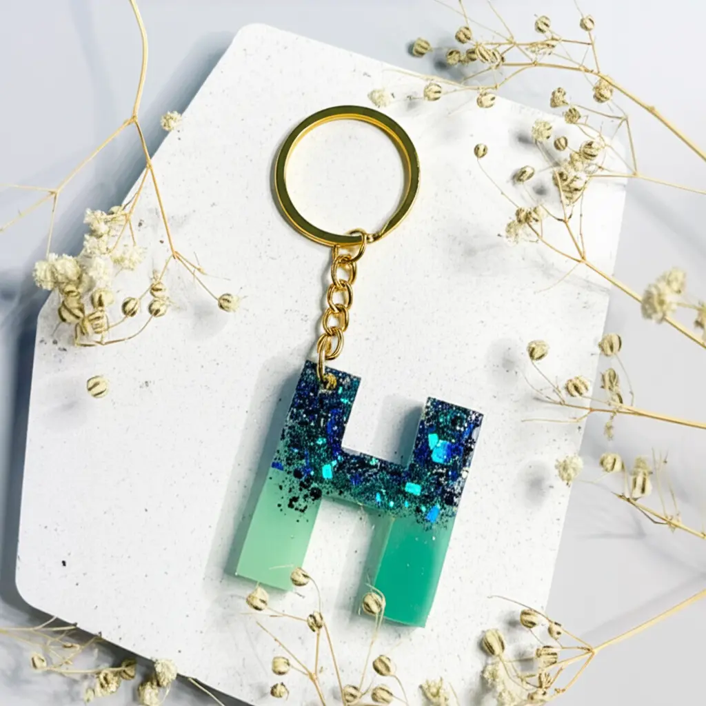 Handmade Glitter Resin 'H' Keychain by Women Artisans - Empower Stop